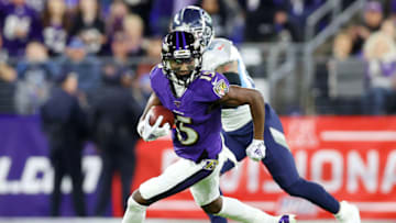BALTIMORE, MARYLAND - JANUARY 11: Marquise Brown #15 of the Baltimore Ravens runs with the ball during the first half against the Tennessee Titans in the AFC Divisional Playoff game at M&T Bank Stadium on January 11, 2020 in Baltimore, Maryland. (Photo by Rob Carr/Getty Images)