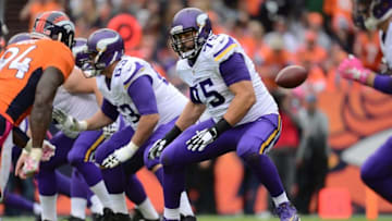 Oct 4, 2015; Denver, CO, USA; Minnesota Vikings tackle Matt Kalil (75) pass protects on Denver Broncos outside linebacker DeMarcus Ware (94) in the fourth quarter at Sports Authority Field at Mile High. The Broncos defeated the Vikings 23-20. Mandatory Credit: Ron Chenoy-USA TODAY Sports