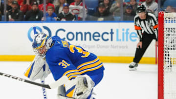 BUFFALO, NY - MARCH 27: Eric Comrie #31 of the Buffalo Sabres during the game against the Montreal Canadiens at KeyBank Center on March 27, 2023 in Buffalo, New York. (Photo by Kevin Hoffman/Getty Images)