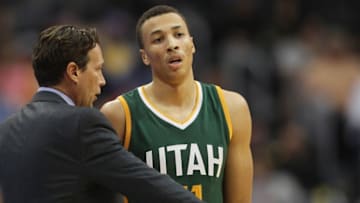 Nov 20, 2016; Denver, CO, USA; Utah Jazz guard Dante Exum (11) and head coach Quin Snyder (left) during the game against the Denver Nuggets at Pepsi Center. The Nuggets won 105-91. Mandatory Credit: Chris Humphreys-USA TODAY Sports