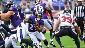 Sep 10, 2023; Baltimore, Maryland, USA; Baltimore Ravens running back J.K. Dobbins (27) carries the ball against the Houston Texans during the first half at M&T Bank Stadium. Mandatory Credit: Brad Mills-USA TODAY Sports
