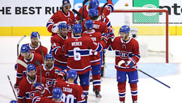 TORONTO, ONTARIO - AUGUST 07: The Montreal Canadiens celebrate the game and series win over the Pittsburgh Penguins aferGame Four of the Eastern Conference Qualification Round prior to the 2020 NHL Stanley Cup Playoffs at Scotiabank Arena on August 07, 2020 in Toronto, Ontario. (Photo by Andre Ringuette/Freestyle Photo/Getty Images)