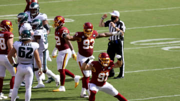 LANDOVER, MARYLAND - SEPTEMBER 13: Ryan Kerrigan #91 of the Washington Football Team celebrates after a play against the Philadelphia Eagles in the second half at FedExField on September 13, 2020 in Landover, Maryland. (Photo by Rob Carr/Getty Images)