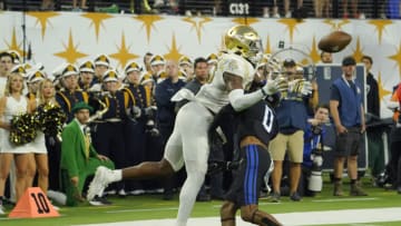 Oct 8, 2022; Paradise, Nevada, USA; Notre Dame Fighting Irish wide receiver Jayden Thomas (83) catches a pass against Brigham Young Cougars wide receiver Kody Epps (0) during the first half at Allegiant Stadium. Mandatory Credit: Lucas Peltier-USA TODAY Sports