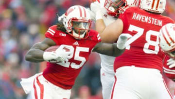 Nov 15, 2014; Madison, WI, USA; Wisconsin Badgers running back Melvin Gordon (25) rushes with the football during the first quarter against the Nebraska Cornhuskers at Camp Randall Stadium. Mandatory Credit: Jeff Hanisch-USA TODAY Sports
