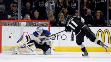 Oct 16, 2014; Los Angeles, CA, USA; St. Louis Blues goalie Brian Elliott (1) blocks a shot by Los Angeles Kings center Anze Kopitar (11) in the shootout at Staples Center. Kings won 1-0. Mandatory Credit: Jayne Kamin-Oncea-USA TODAY Sports