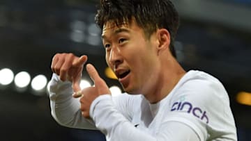Tottenham Hotspur's South Korean striker Son Heung-Min celebrates after scoring the opening goal of the English Premier League football match between Liverpool and Tottenham Hotspur at Anfield in Liverpool, north west England on May 7, 2022. - - RESTRICTED TO EDITORIAL USE. No use with unauthorized audio, video, data, fixture lists, club/league logos or 'live' services. Online in-match use limited to 120 images. An additional 40 images may be used in extra time. No video emulation. Social media in-match use limited to 120 images. An additional 40 images may be used in extra time. No use in betting publications, games or single club/league/player publications. (Photo by Paul ELLIS / AFP) / RESTRICTED TO EDITORIAL USE. No use with unauthorized audio, video, data, fixture lists, club/league logos or 'live' services. Online in-match use limited to 120 images. An additional 40 images may be used in extra time. No video emulation. Social media in-match use limited to 120 images. An additional 40 images may be used in extra time. No use in betting publications, games or single club/league/player publications. / RESTRICTED TO EDITORIAL USE. No use with unauthorized audio, video, data, fixture lists, club/league logos or 'live' services. Online in-match use limited to 120 images. An additional 40 images may be used in extra time. No video emulation. Social media in-match use limited to 120 images. An additional 40 images may be used in extra time. No use in betting publications, games or single club/league/player publications. (Photo by PAUL ELLIS/AFP via Getty Images)