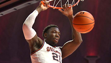 Dec 3, 2021; Champaign, Illinois, USA; Illinois Fighting Illini center Kofi Cockburn (21) dunks the ball during the first half against the Rutgers Scarlet Knights at State Farm Center. Mandatory Credit: Ron Johnson-USA TODAY Sports