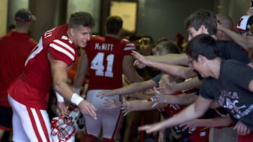 Oct 22, 2016; Lincoln, NE, USA; Nebraska Cornhuskers wide receiver Brandon Reilly (87) celebrates with fans after defeating the Purdue Boilermakers at Memorial Stadium. Nebraska won 27-14. Mandatory Credit: Bruce Thorson-USA TODAY Sports