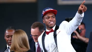 Jun 23, 2016; New York, NY, USA; Buddy Hield (Oklahoma) gestures to the crowd after being selected as the number six overall pick to the New Orleans Pelicans in the first round of the 2016 NBA Draft at Barclays Center. Mandatory Credit: Jerry Lai-USA TODAY Sports