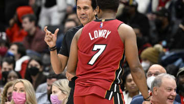 Head coach Erik Spoelstra of the Miami Heat talks with Kyle Lowry #7 during the game against the Washington Wizards(Photo by G Fiume/Getty Images)