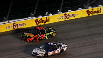 DARLINGTON, SC - SEPTEMBER 02: Kevin Harvick, driver of the #4 Busch Beer Throwback Ford, leads Martin Truex Jr., driver of the #78 Bass Pro Shops/5-hour ENERGY Toyota, during the Monster Energy NASCAR Cup Series Bojangles' Southern 500 at Darlington Raceway on September 2, 2018 in Darlington, South Carolina. (Photo by Sarah Crabill/Getty Images)