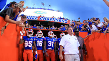 GAINESVILLE, FL - SEPTEMBER 17: Head coach Jim McElwain leads the Florida Gators onto the field before the game against the North Texas Mean Green at Ben Hill Griffin Stadium on September 17, 2016 in Gainesville, Florida. (Photo by Rob Foldy/Getty Images)