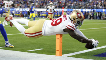 INGLEWOOD, CALIFORNIA - JANUARY 30: Deebo Samuel #19 of the San Francisco 49ers dives to score a touchdown in the second quarter against the Los Angeles Rams in the NFC Championship Game at SoFi Stadium on January 30, 2022 in Inglewood, California. (Photo by Christian Petersen/Getty Images)