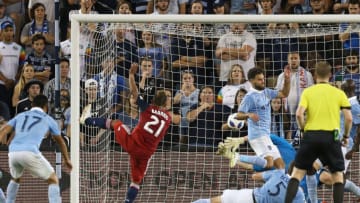 KANSAS CITY, KS - JULY 28: FC Dallas midfielder Michael Barrios (21) gets the shot past multiple defenders and Sporting Kansas City goalkeeper Tim Melia (29) for a hat trick in the second half of an MLS match between FC Dallas and Sporting Kansas City on July 28, 2018 at Children's Mercy Park in Kansas City, KS. FC Dallas was 3-2. (Photo by Scott Winters/Icon Sportswire via Getty Images)