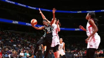 WASHINGTON, DC - SEPTEMBER 20: Swin Cash #32 of the New York Liberty drives to the basket against the Washington Mystics in Game Two of the WNBA Western Conference Semifinals on September 20, 2015 at the Verizon Center in Washington, DC. NOTE TO USER: User expressly acknowledges and agrees that, by downloading and or using this Photograph, user is consenting to the terms and conditions of the Getty Images License Agreement. Mandatory Copyright Notice: Copyright 2015 NBAE (Photo by Ned Dishman/NBAE via Getty Images)