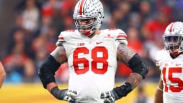 Jan 1, 2016; Glendale, AZ, USA; Ohio State Buckeyes offensive lineman Taylor Decker (68) against the Notre Dame Fighting Irish during the 2016 Fiesta Bowl at University of Phoenix Stadium. The Buckeyes defeated the Fighting Irish 44-28. Mandatory Credit: Mark J. Rebilas-USA TODAY Sports