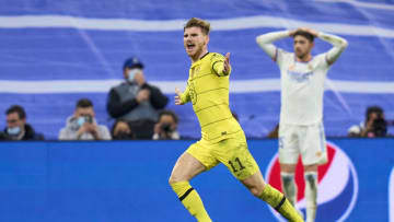 MADRID, SPAIN - APRIL 12: Timo Werner of Chelsea FC celebrates after scoring his team's third goal during the UEFA Champions League Quarter Final Leg Two match between Real Madrid and Chelsea FC at Estadio Santiago Bernabeu on April 12, 2022 in Madrid, Spain. (Photo by Diego Souto/Quality Sport Images/Getty Images)