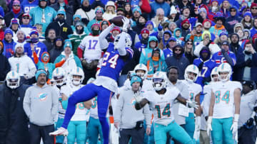 Jan 15, 2023; Orchard Park, NY, USA; Buffalo Bills cornerback Kaiir Elam (24) intercepts a pass intended for Miami Dolphins wide receiver Trent Sherfield (14) during the second half in a NFL wild card game at Highmark Stadium. Mandatory Credit: Gregory Fisher-USA TODAY Sports