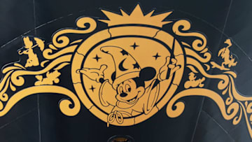 PAPENBURG, GERMANY - JANUARY 20: A logo featuring Mickey Mouse is seen on the "Disney Fantasy" cruise ship at the Meyer Werft shipyards before the ship's departure on January 20, 2012 in Papenburg, Germany. The completed 130,000-tonne ship, which is 1,115 feet long and can accommodate 5,450 passengers, cast and crew, was scheduled to travel up the Ems River later in the day in order to reach the North Sea. (Photo by Sean Gallup/Getty Images)