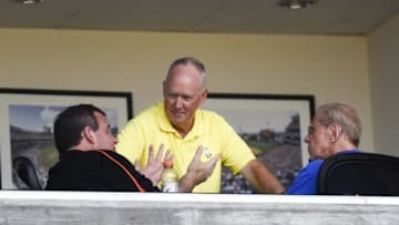 Mar 12, 2015; Port St. Lucie, FL, USA; New Jersey governor Chris Christie (left) with New York Mets general manager Sandy Alderson (middle) and owner Fred Wilpon chat during the game against the Washington Nationals at Tradition Field. Mandatory Credit: Brad Barr-USA TODAY Sports