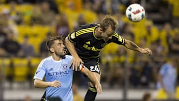 Aug 13, 2016; Columbus, OH, USA; Columbus Crew SC defender Nicolai Naess (24) heads the ball over the top of New York City FC forward David Villa (7) at MAPFRE Stadium. Mandatory Credit: Greg Bartram-USA TODAY Sports