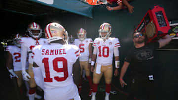 Deebo Samuel #19, Trent Williams #71 and Jimmy Garoppolo #10 of the San Francisco 49ers (Photo by Michael Zagaris/San Francisco 49ers/Getty Images)
