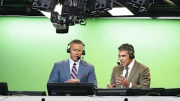 Aug 30, 2014; Arlington, TX, USA; ESPN broadcasters Kirk Herbstreit (right) and Chris Fowler announce the game with the Florida State Seminoles playing against the Oklahoma State Cowboys at AT&T Stadium. Mandatory Credit: Matthew Emmons-USA TODAY Sports