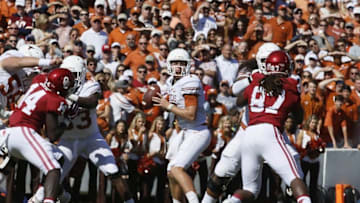 Oct 8, 2016; Dallas, TX, USA; Texas Longhorns quarterback Shane Buechele (7) throws a pass in the first quarter against the Oklahoma Sooners at Cotton Bowl. Mandatory Credit: Tim Heitman-USA TODAY Sports