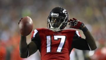 Sep 18, 2014; Atlanta, GA, USA; Atlanta Falcons wide receiver Devin Hester (17) reacts as he scores a touchdown on a punt return against the Tampa Bay Buccaneers during the first half at the Georgia Dome. The Falcons defeated the Buccaneers 56-14. Mandatory Credit: Dale Zanine-USA TODAY Sports