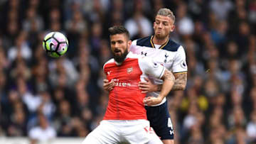 LONDON, ENGLAND - APRIL 30: Olivier Giroud of Arsenal and Toby Alderweireld of Tottenham Hotspur compete for the ball during the Premier League match between Tottenham Hotspur and Arsenal at White Hart Lane on April 30, 2017 in London, England. (Photo by Shaun Botterill/Getty Images)