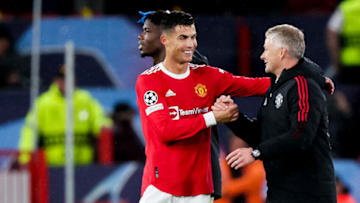 MANCHESTER, UNITED KINGDOM - SEPTEMBER 29: (L-R) Cristiano Ronaldo of Manchester United, coach Ole Gunnar Solskjaer of Manchester United during the UEFA Champions League match between Manchester United v Villarreal at the Old Trafford on September 29, 2021 in Manchester United Kingdom (Photo by David S. Bustamante/Soccrates/Getty Images)