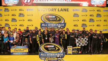 May 16, 2015; Concord, NC, USA; NASCAR Sprint Cup Series driver Denny Hamlin (11) celebrates after winning the Sprint All-Star Race at Charlotte Motor Speedway. Mandatory Credit: Randy Sartin-USA TODAY Sports