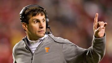 FAYETTEVILLE, AR - NOVEMBER 12: Head Coach Derek Dooley of the Tennessee Volunteers signals to the sidelines during a game against the Arkansas Razorbacks at Donald W. Reynolds Stadium Stadium on November 12, 2011 in Fayetteville, Arkansas. The Razorbacks defeated the Volunteers 49 to 7. (Photo by Wesley Hitt/Getty Images)