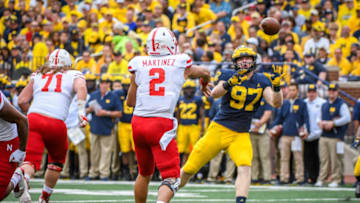 ANN ARBOR, MI - SEPTEMBER 22: Nebraska Cornhuskers quarterback Adrian Martinez (2) throws past the rushing Michigan Wolverines defensive lineman Aidan Hutchinson (97) during the Michigan Wolverines versus Nebraska Cornhuskers game on Saturday September 22, 2018 at Michigan Stadium in Ann Arbor, MI. (Photo by Steven King/Icon Sportswire via Getty Images)