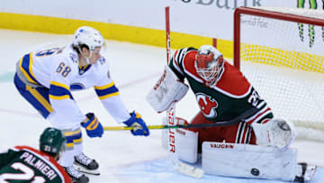 Mar 16, 2021; Newark, New Jersey, USA; New Jersey Devils goaltender Mackenzie Blackwood (29) makes a save against Buffalo Sabres right wing Victor Olofsson (68) during the third period at Prudential Center. Mandatory Credit: Vincent Carchietta-USA TODAY Sports