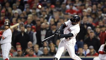 BOSTON, MA - OCTOBER 14: Jackie Bradley Jr. #19 of the Boston Red Sox hits a three-run double during the third inning against the Houston Astros in Game Two of the American League Championship Series at Fenway Park on October 14, 2018 in Boston, Massachusetts. (Photo by Elsa/Getty Images)