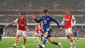 LONDON, ENGLAND - AUGUST 22: Kai Havertz of Chelsea battles for possession with Cedric Soares of Arsenal during the Premier League match between Arsenal and Chelsea at Emirates Stadium on August 22, 2021 in London, England. (Photo by Michael Regan/Getty Images)
