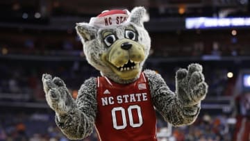 Mar 9, 2016; Washington, DC, USA; The North Carolina State Wolfpack mascot "Mr. Wuf" cheers on the court during a timeout against the Duke Blue Devils in the second half during day two of the ACC conference tournament at Verizon Center. The Blue Devils won 92-89. Mandatory Credit: Geoff Burke-USA TODAY Sports