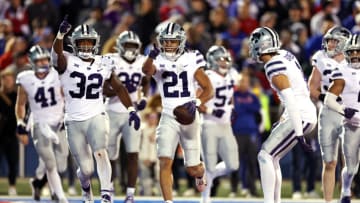 LAWRENCE, KANSAS - NOVEMBER 18: Safety Marques Sigle #21 of the Kansas State Wildcats points to fans after intercepting a pass in the end zone during the 2nd half of the game against the Kansas Jayhawks at David Booth Kansas Memorial Stadium on November 18, 2023 in Lawrence, Kansas. (Photo by Jamie Squire/Getty Images)