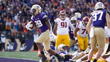 Sep 28, 2019; Seattle, WA, USA; Washington Huskies running back Richard Newton (28) skips into the end zone for a touchdown against the USC Trojans during the first quarter at Husky Stadium. Mandatory Credit: Jennifer Buchanan-USA TODAY Sports
