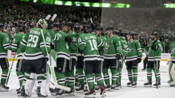 Oct 12, 2023; Dallas, Texas, USA; Dallas Stars goaltender Jake Oettinger (29) and the Stars celebrate the victory over the St. Louis Blues in the overtime shootout period at the American Airlines Center. Mandatory Credit: Jerome Miron-USA TODAY Sports