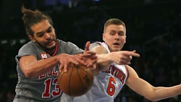 Dec 19, 2015; New York, NY, USA; Chicago Bulls center Joakim Noah (13) and New York Knicks forward Kristaps Porzingis (6) battle for a rebound during the first half at Madison Square Garden. Mandatory Credit: Noah K. Murray-USA TODAY Sports