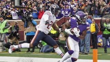 Dec 20, 2015; Minneapolis, MN, USA; Minnesota Vikings wide receiver Stefon Diggs (14) catches a pass for a touchdown past Chicago Bears safety Ryan Mundy (21) in the first quarter at TCF Bank Stadium. Mandatory Credit: Bruce Kluckhohn-USA TODAY Sports