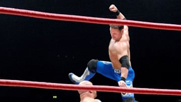 MANCHESTER, ENGLAND - JANUARY 29: Daniels, AJ Styles and Hernandez of TNA Wrestling perform at MEN Arena on January 29, 2010 in Manchester, England. (Photo by Shirlaine Forrest/WireImage)