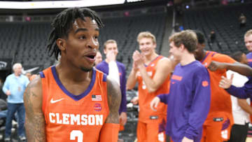 LAS VEGAS, NEVADA - NOVEMBER 24: Al-Amir Dawes #2 of the Clemson Tigers celebrates the team's 62-60 overtime victory over the TCU Horned Frogs during the MGM Resorts Main Event basketball tournament at T-Mobile Arena on November 24, 2019 in Las Vegas, Nevada. (Photo by Ethan Miller/Getty Images)