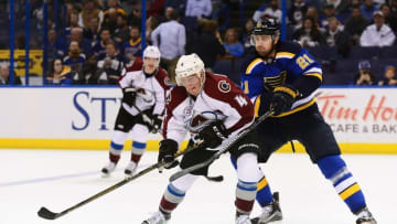 Mar 29, 2016; St. Louis, MO, USA; Colorado Avalanche defenseman Tyson Barrie (4) skates with the puck as St. Louis Blues center Patrik Berglund (21) defends during the third period at Scottrade Center. The Blues won 3-1. Mandatory Credit: Jeff Curry-USA TODAY Sports