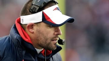 Dec 8, 2013; Foxborough, MA, USA; New England Patriots offensive coordinator Josh McDaniels looks on during the fourth quarter of New England
