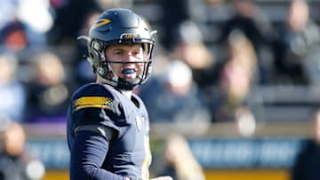 TOLEDO, OH - NOVEMBER 24: Toledo Rockets quarterback Logan Woodside (11) looks to the sideline for a play during game action between the Western Michigan Broncos and the Toledo Rockets on November 24, 2017 at Glass Bowl Stadium in Toledo, Ohio. Toledo defeated Western Michigan 37-10 to advance to the MAC championship game. (Photo by Scott W. Grau/Icon Sportswire via Getty Images)