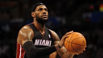 Feb 20, 2014; Oklahoma City, OK, USA; Miami Heat small forward LeBron James (6) attempts a free throw shot against the Oklahoma City Thunder during the second quarter at Chesapeake Energy Arena. Mandatory Credit: Mark D. Smith-USA TODAY Sports